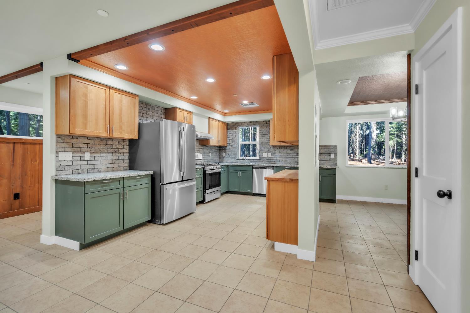 740 Hideaway Loop Alta, CA 95701 - Photo 11 of 74 a kitchen with a refrigerator and a sink