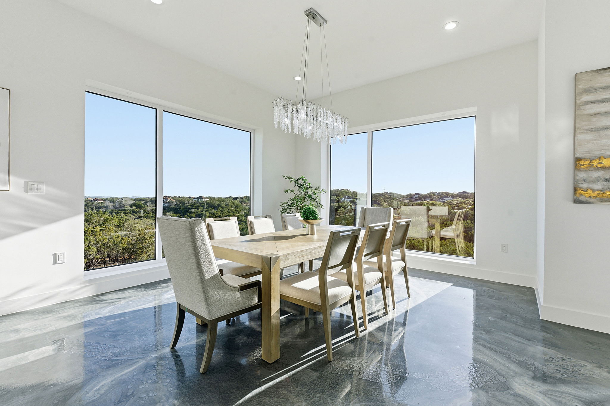 15400 Watumba Road Austin, TX 78734 - Photo 16 of 39 a view of a dining room with furniture window and wooden floor