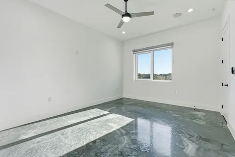 an empty room with windows