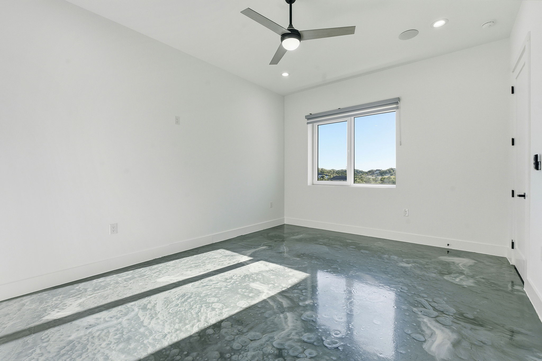 15400 Watumba Road Austin, TX 78734 - Photo 22 of 39 an empty room with windows