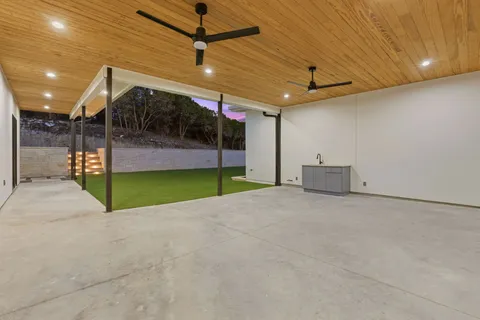 a view of a backyard of a house