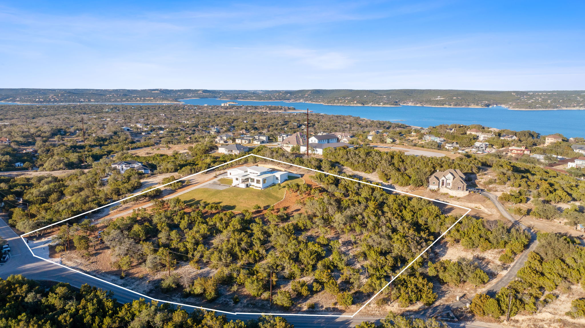 15400 Watumba Road Austin, TX 78734 - Photo 39 of 39 an aerial view of residential building and lake