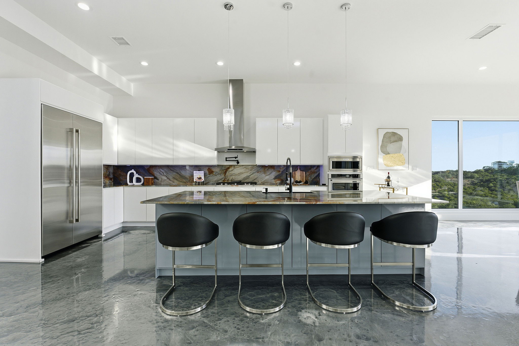 15400 Watumba Road Austin, TX 78734 - Photo 10 of 39 a kitchen with a sink cabinets and window