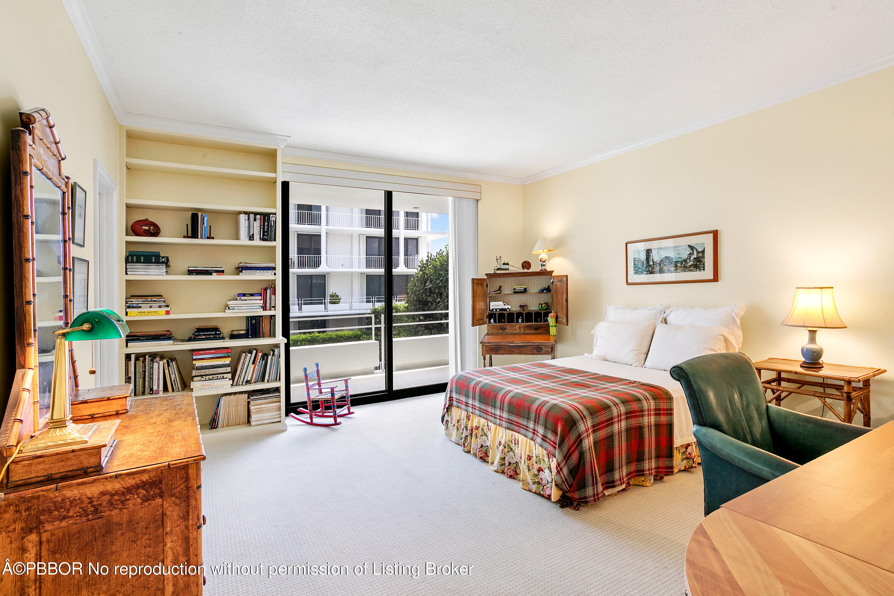 2150 Ibis Isle Road, Unit 7 Palm Beach, FL 33480 - Photo 28 of 49 a bedroom with bed and a large window with the garden view