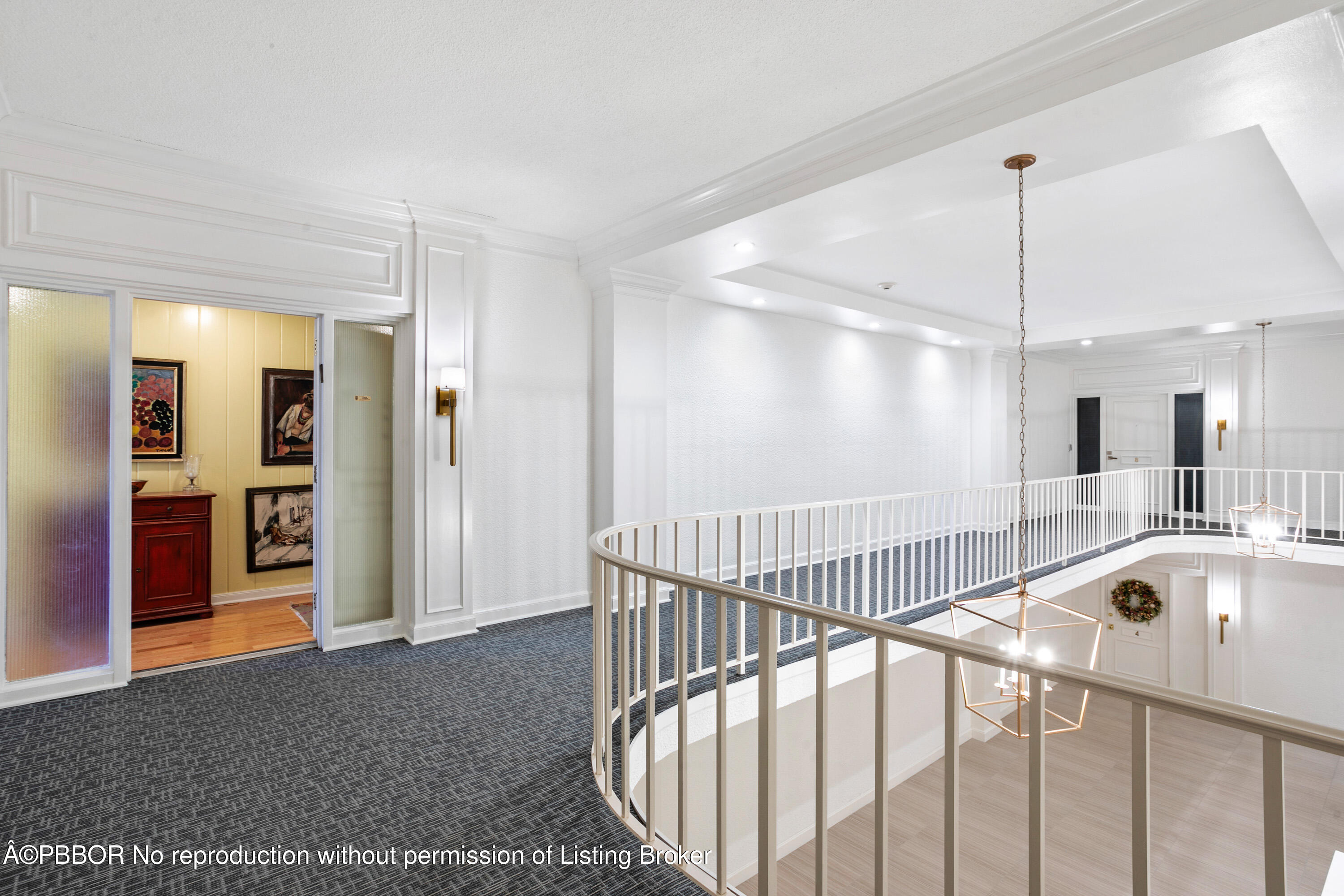 2150 Ibis Isle Road, Unit 7 Palm Beach, FL 33480 - Photo 34 of 49 a view of a hallway with a dining table chairs