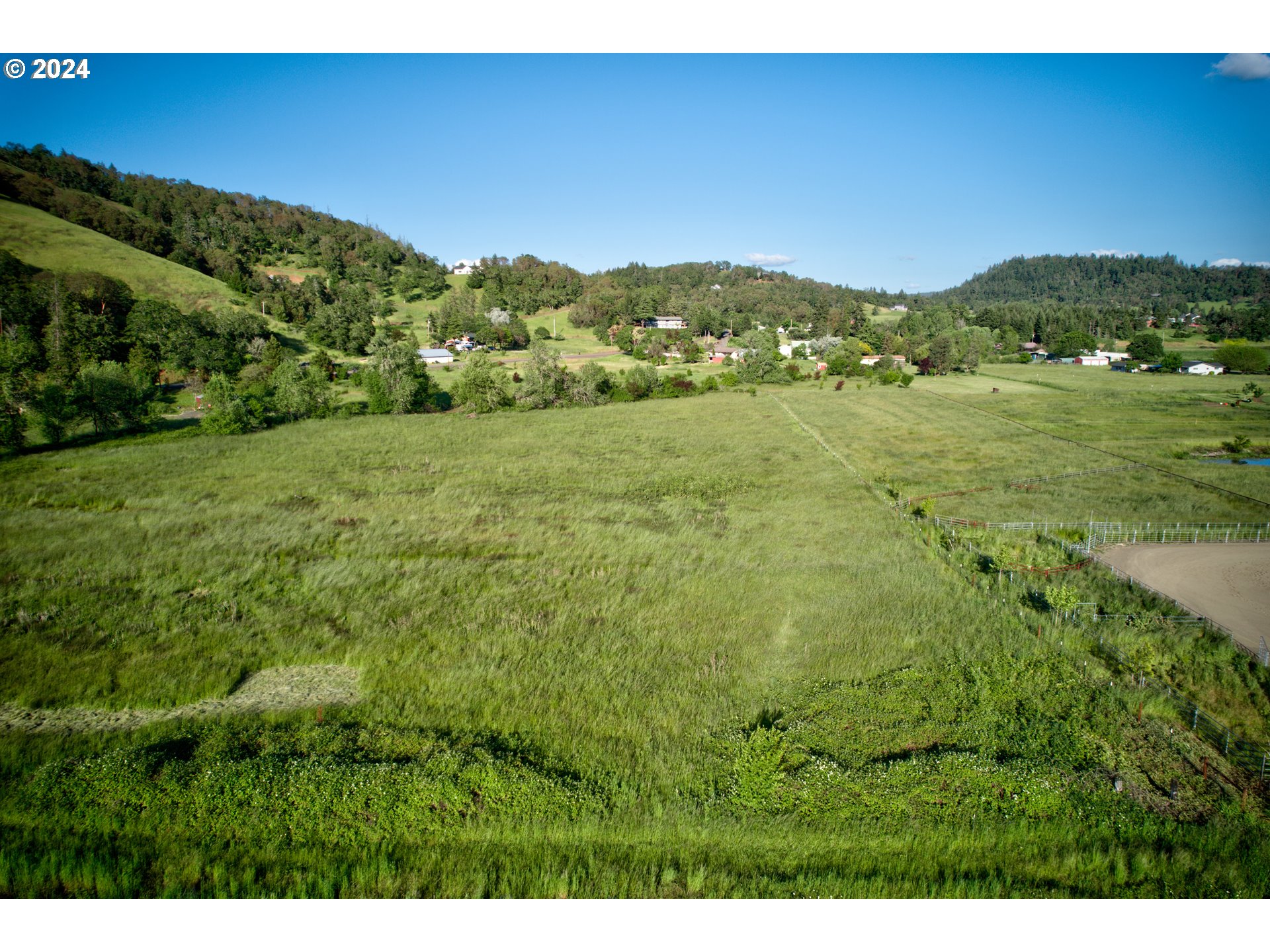 0 Healy Road, Unit 402 Roseburg, OR 97471 - Photo 15 of 24 a view of an green field and mountains
