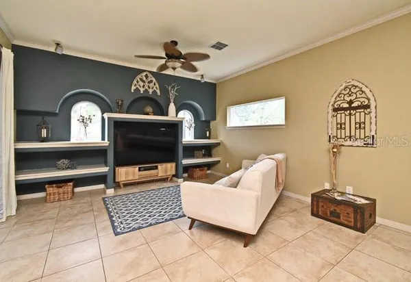 a dining room with furniture and window