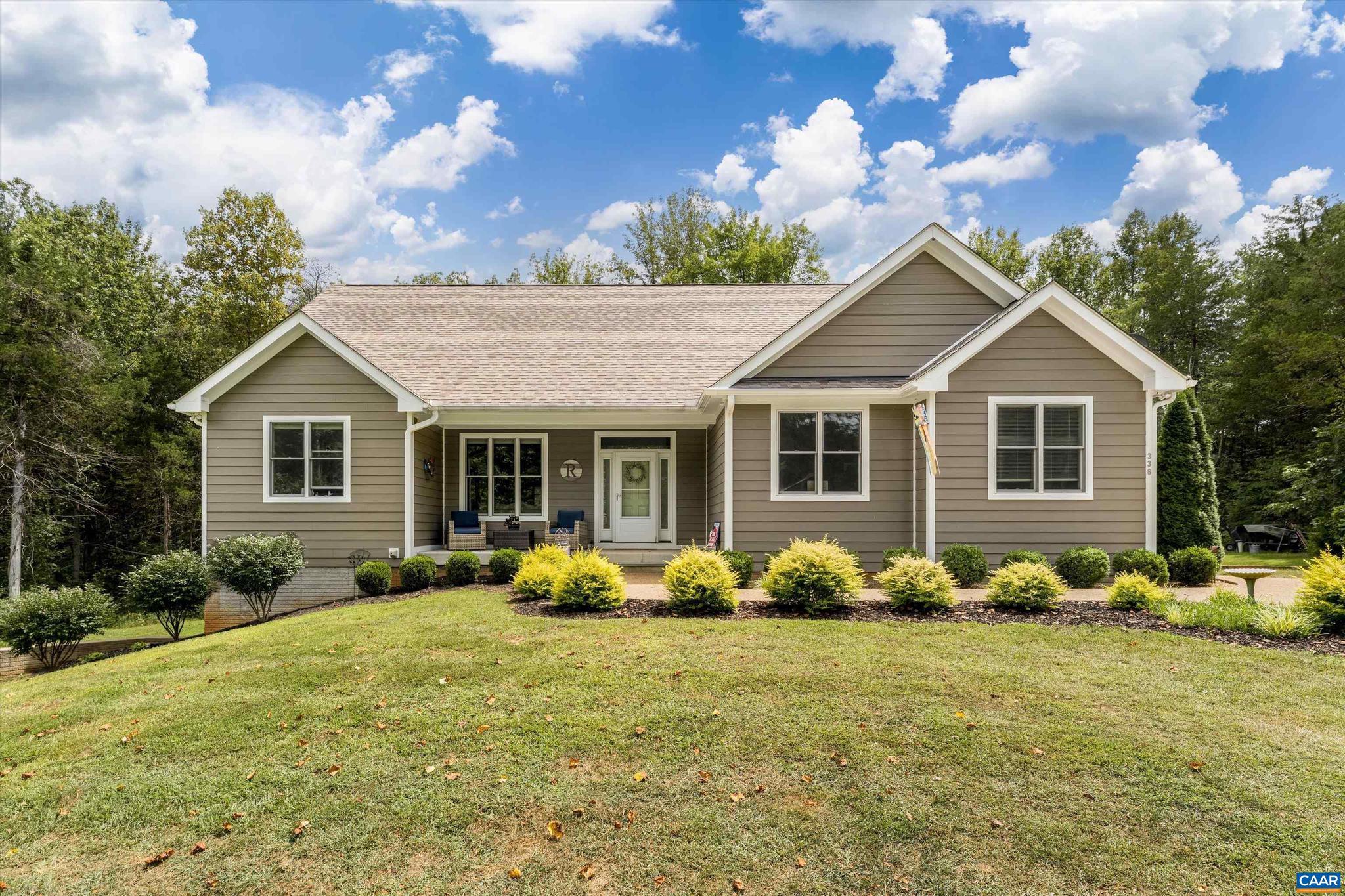 336 Bear Run Road Stanardsville, VA 22973 - Photo 2 of 67 a front view of a house with garden