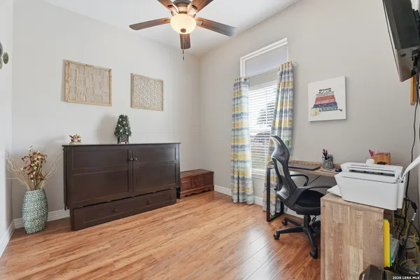 a view of a livingroom with furniture and wooden floor
