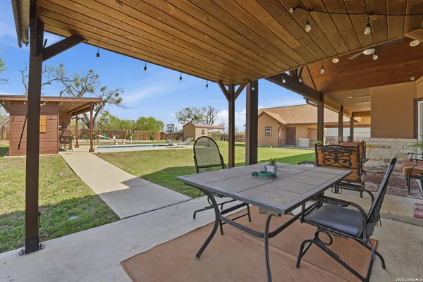 an aerial view of residential houses with outdoor space