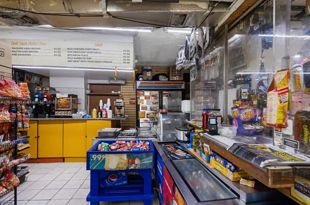 a view of city with the shops and fruits market