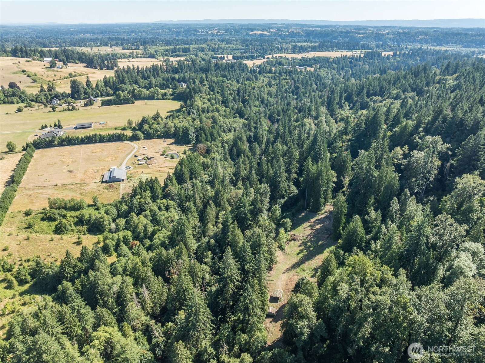 0 Northeast Johnson Road La Center, WA 98629 - Photo 19 of 27 an aerial view of residential building with green space