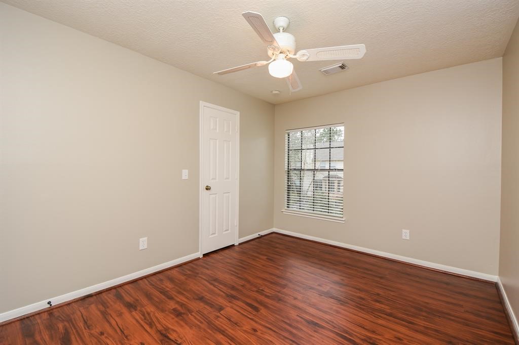 27 West Rumple Creek Place Spring, TX 77381 - Photo 21 of 32 Secondary bedroom #1