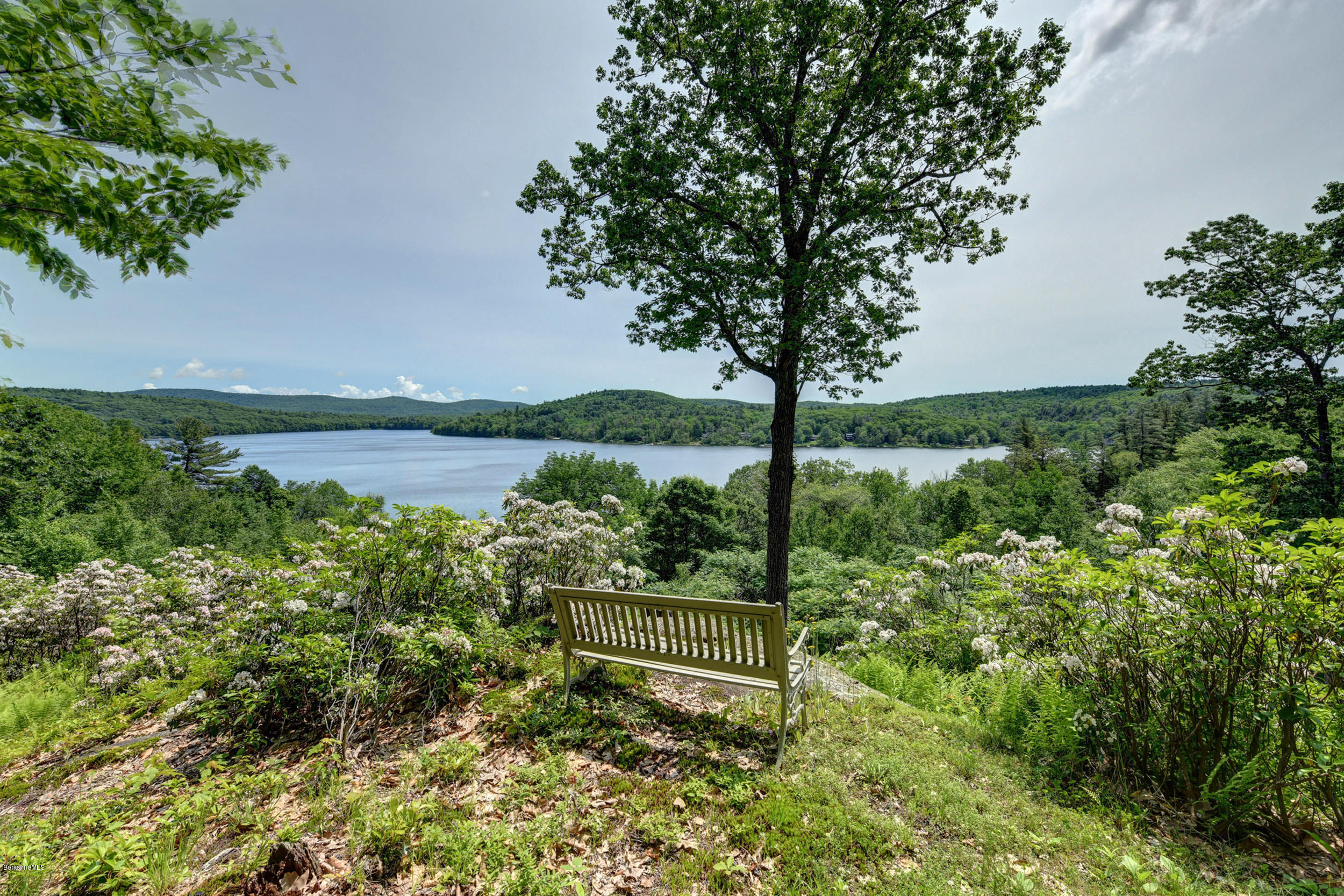 17A Goose Pond Road Tyringham, MA 01238 - Photo 24 of 29 a view of a garden with wooden fence