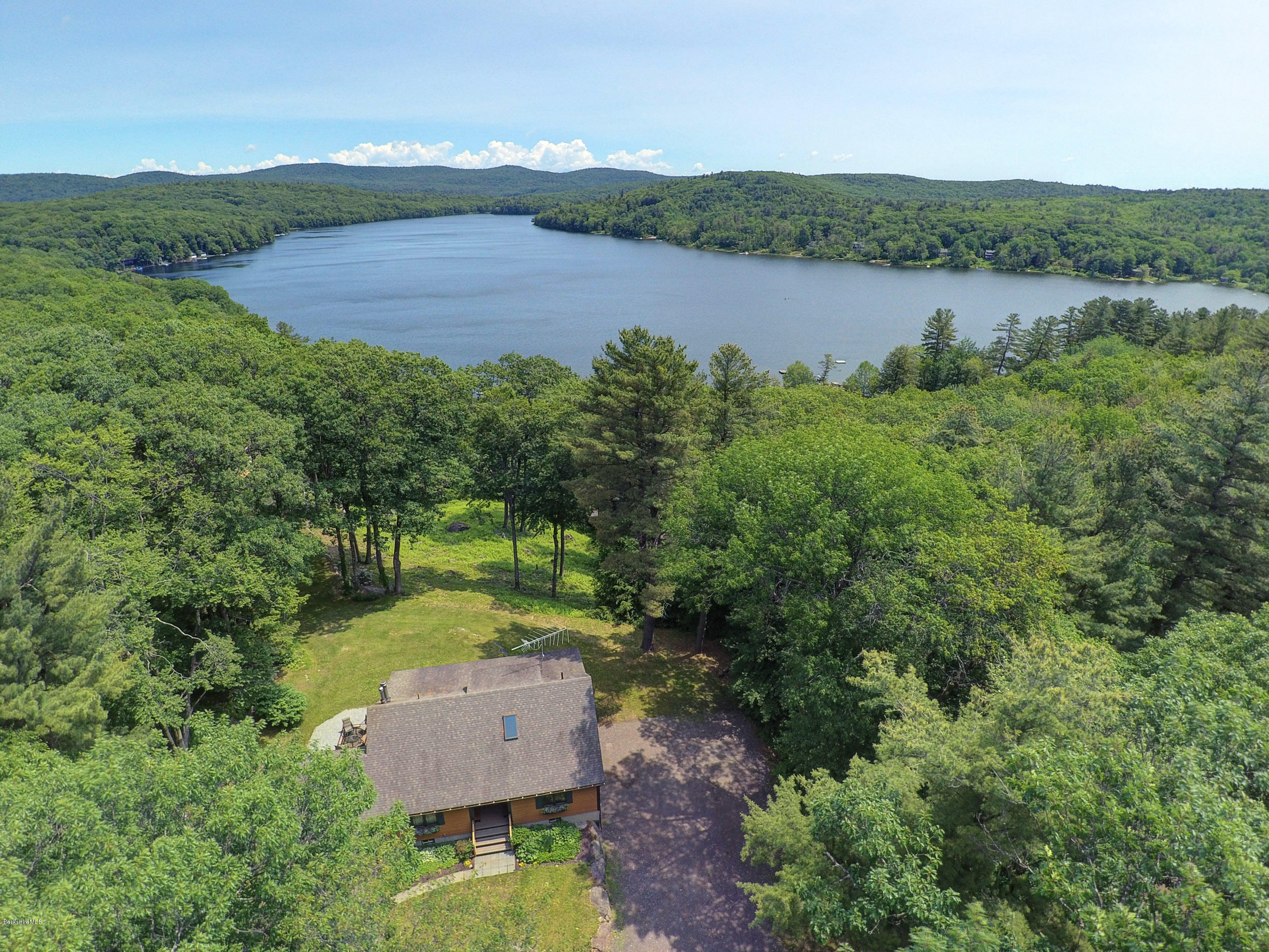 17A Goose Pond Road Tyringham, MA 01238 - Photo 27 of 29 an aerial view of a house with a yard and lake view