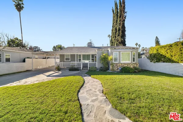a view of a house with swimming pool