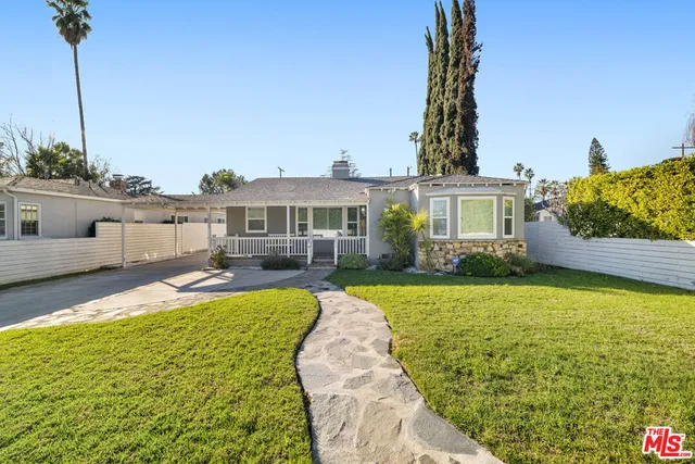a view of a house with swimming pool