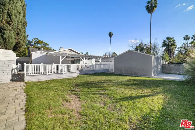 a house view with a outdoor space