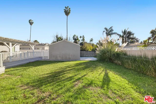 a view of a garden with a lake