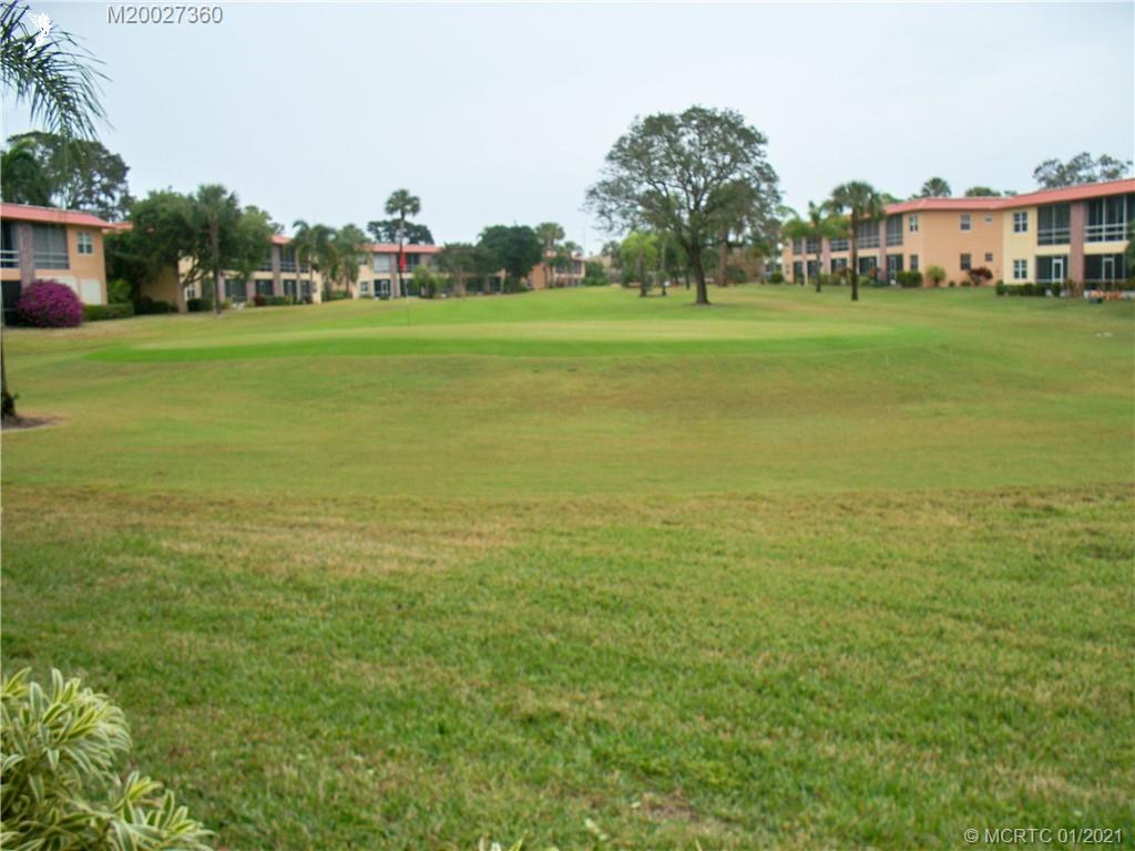 1939 Southwest Palm City Road, Unit 20E Stuart, FL 34994 - Photo 30 of 32 View right down the fairway and hole
