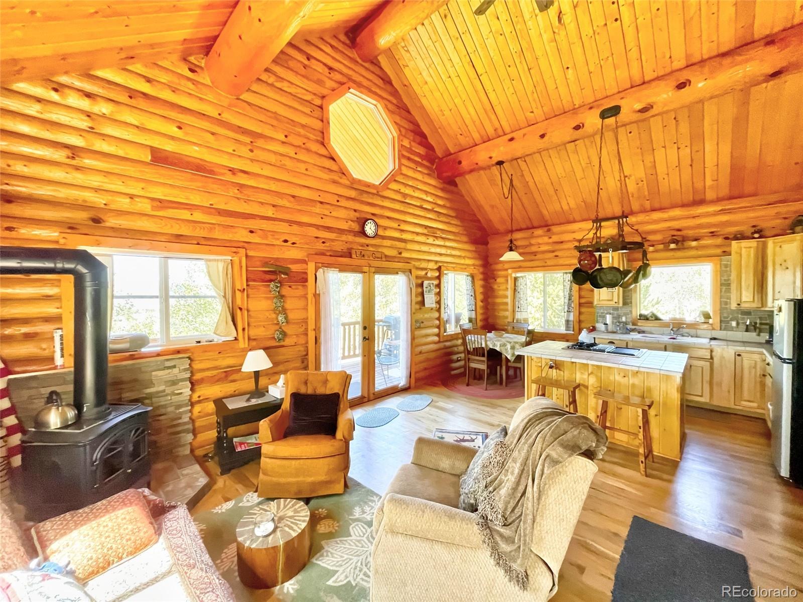 43 Pintail Road Como, CO 80432 - Photo 15 of 34 a very nice looking living room with a large kitchen and a table