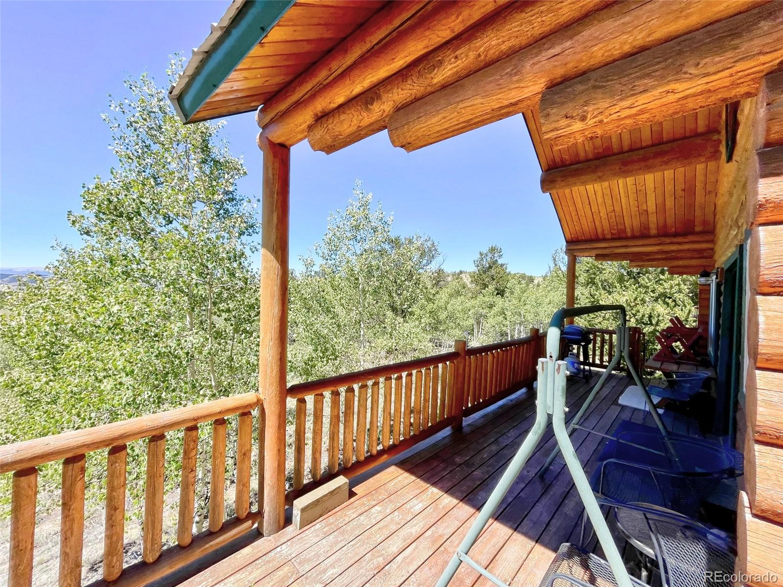 43 Pintail Road Como, CO 80432 - Photo 22 of 34 a view of balcony with wooden floor and outdoor seating