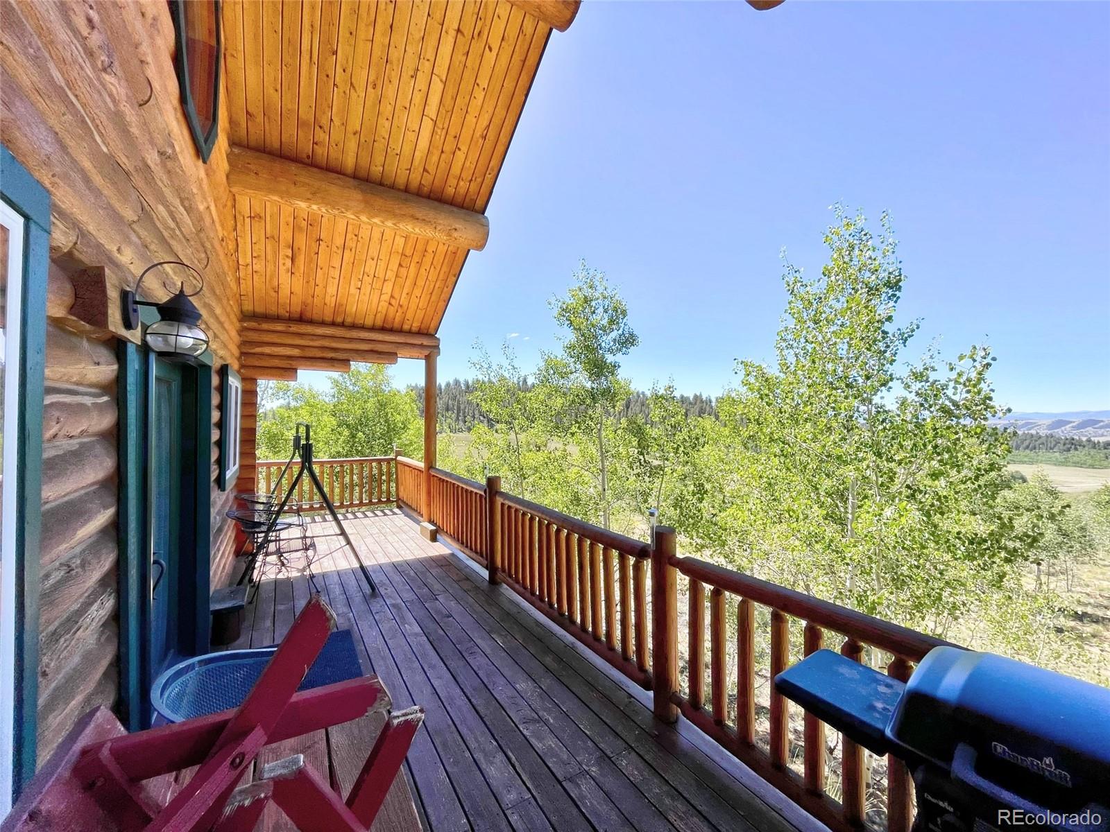 43 Pintail Road Como, CO 80432 - Photo 23 of 34 a view of balcony with wooden floor and outdoor seating