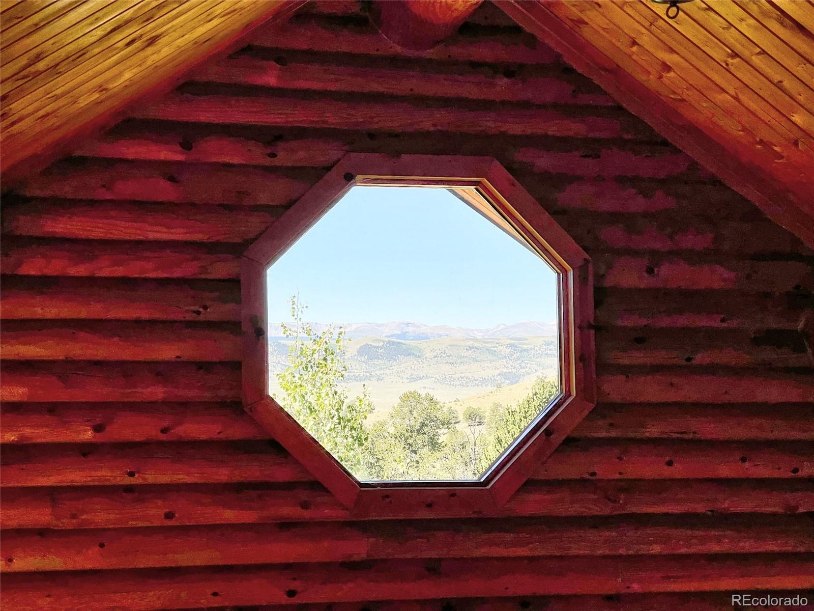 43 Pintail Road Como, CO 80432 - Photo 24 of 34 a view of entryway with wooden floor and a window