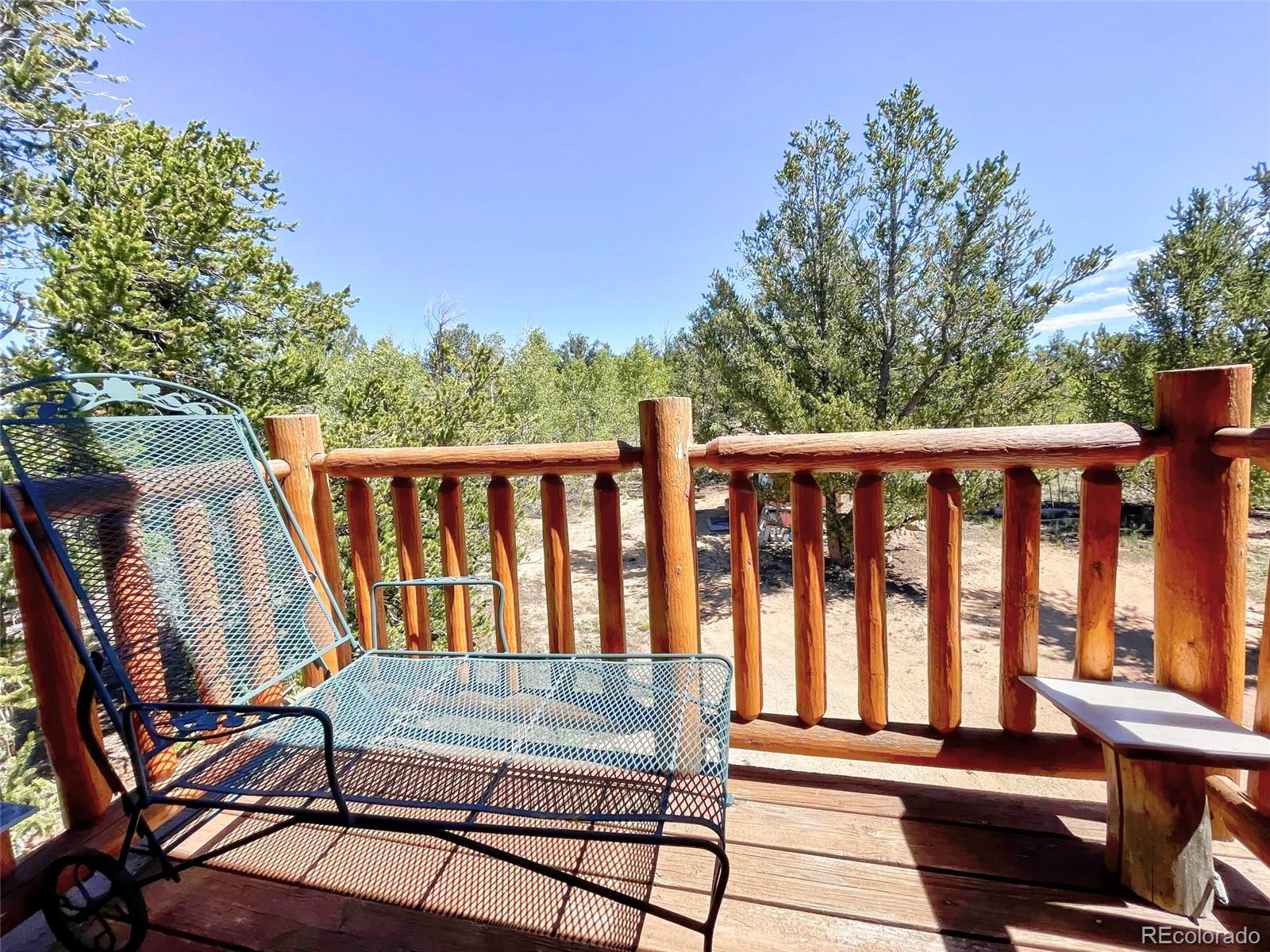 43 Pintail Road Como, CO 80432 - Photo 27 of 34 a view of wooden balcony with chairs