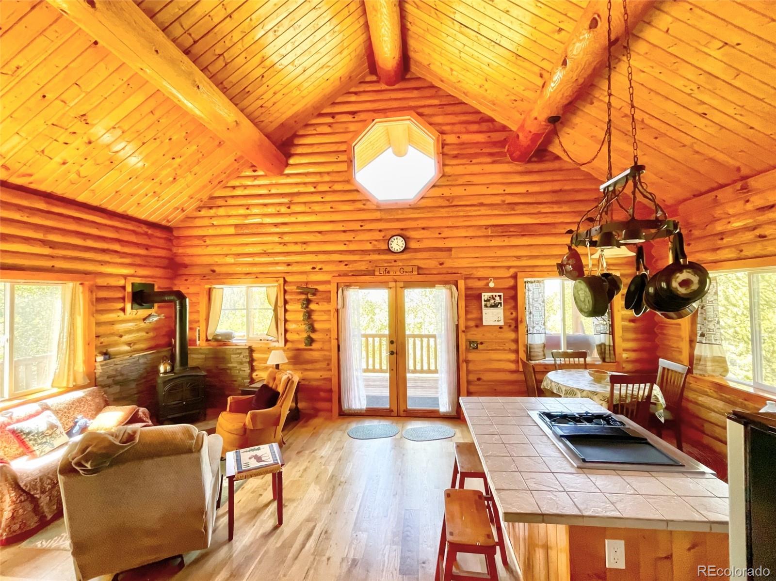 43 Pintail Road Como, CO 80432 - Photo 4 of 34 a living room with furniture and a wooden floor