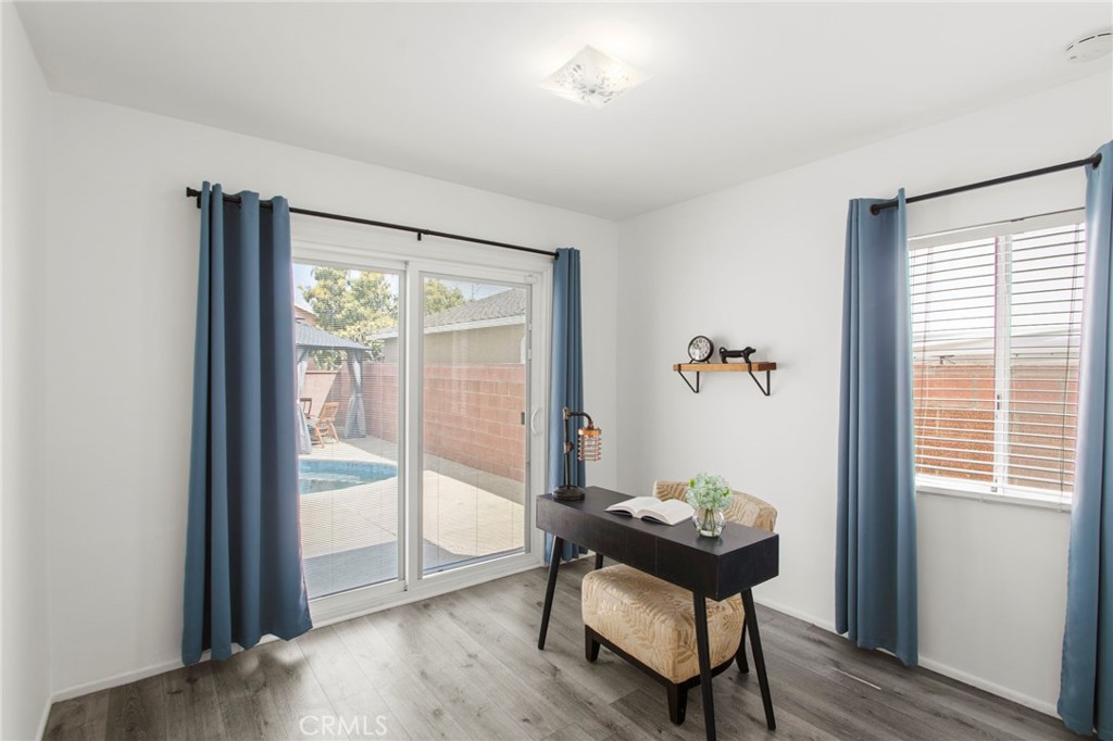 11339 Cecilia Street Downey, CA 90241 - Photo 13 of 17 a room that has a window and a table in it