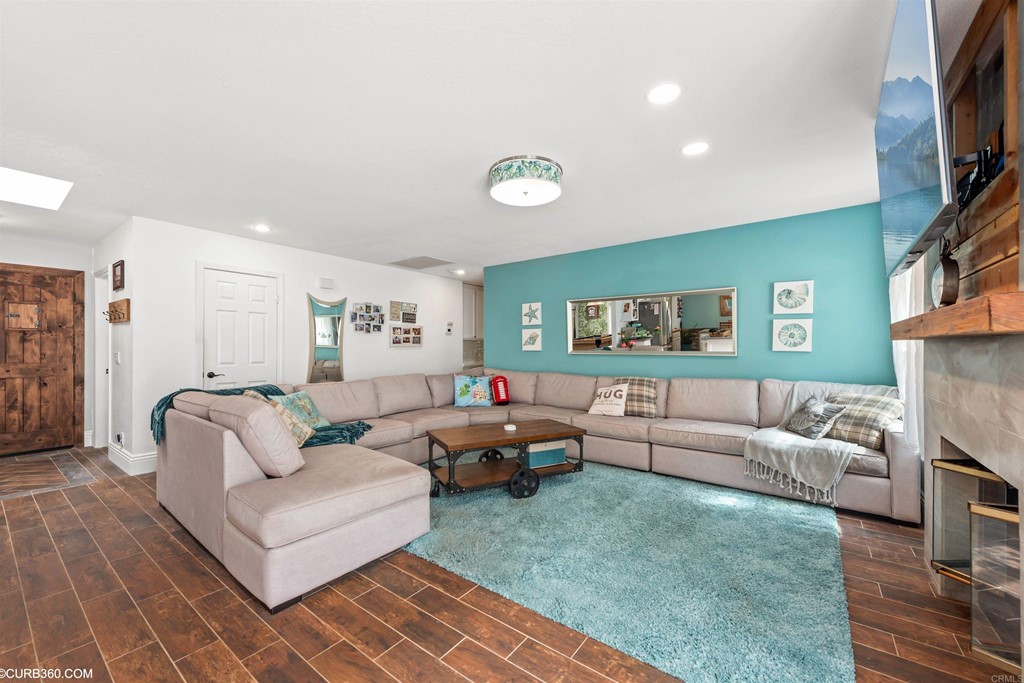 1179 Patricia Circle Vista, CA 92084 - Photo 14 of 48 a living room with furniture and a fireplace