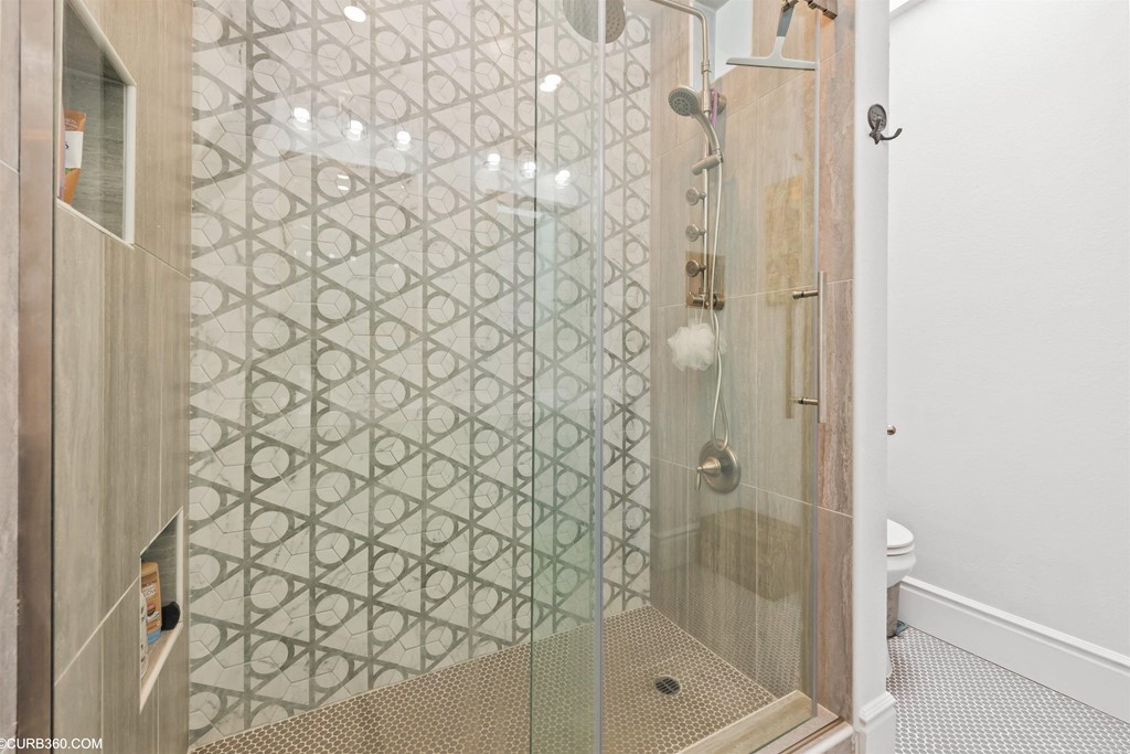 1179 Patricia Circle Vista, CA 92084 - Photo 30 of 48 a bathroom with a shower curtain