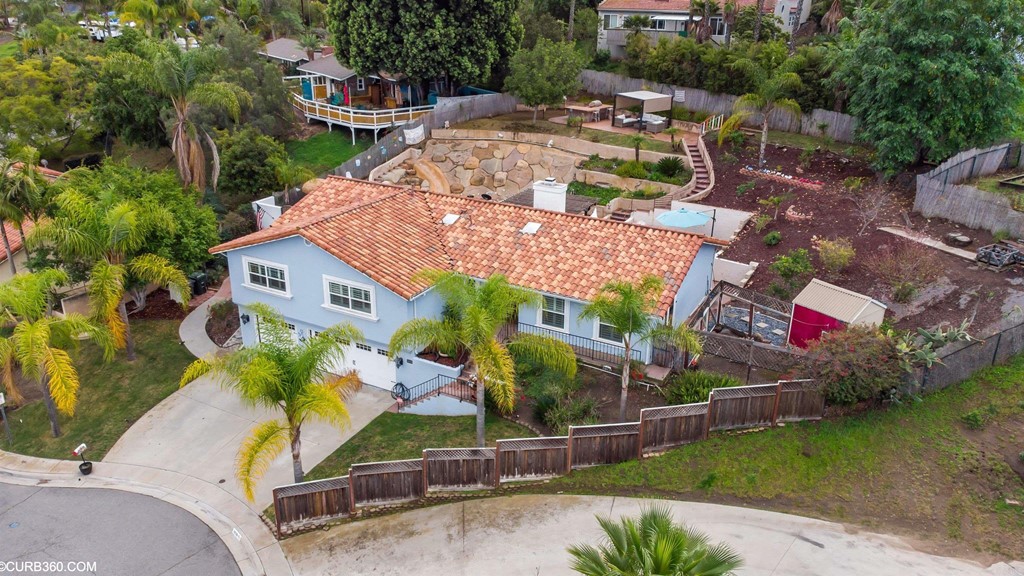 1179 Patricia Circle Vista, CA 92084 - Photo 40 of 48 an aerial view of a house with a garden and plants