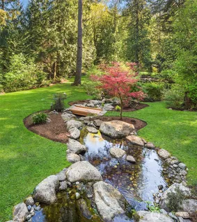 a view of a street with a park