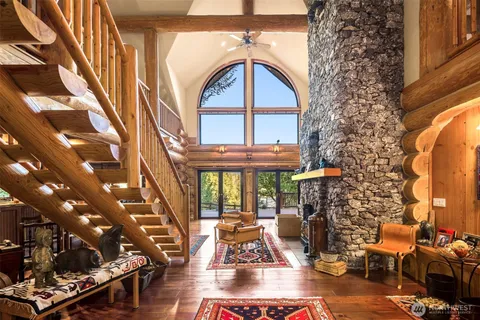 a view of swimming pool with outdoor seating