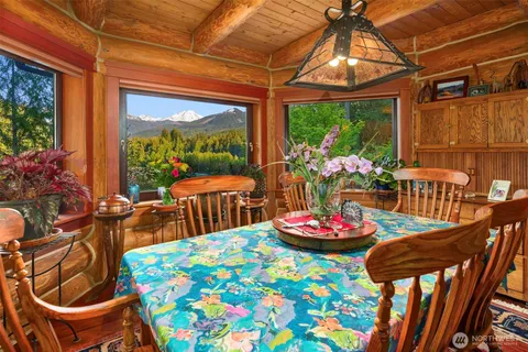 a view of a balcony with wooden floor
