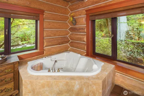 an aerial view of a house with a garden