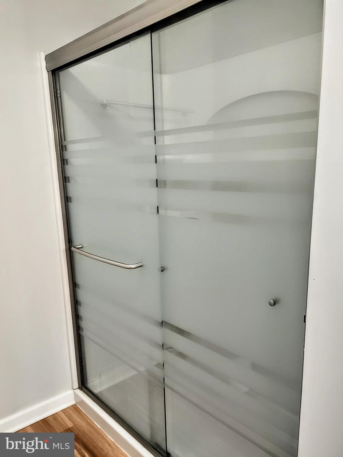 645 West 1st Street Boiling Springs, PA 17007 - Photo 13 of 23 a bathroom with a glass shower door