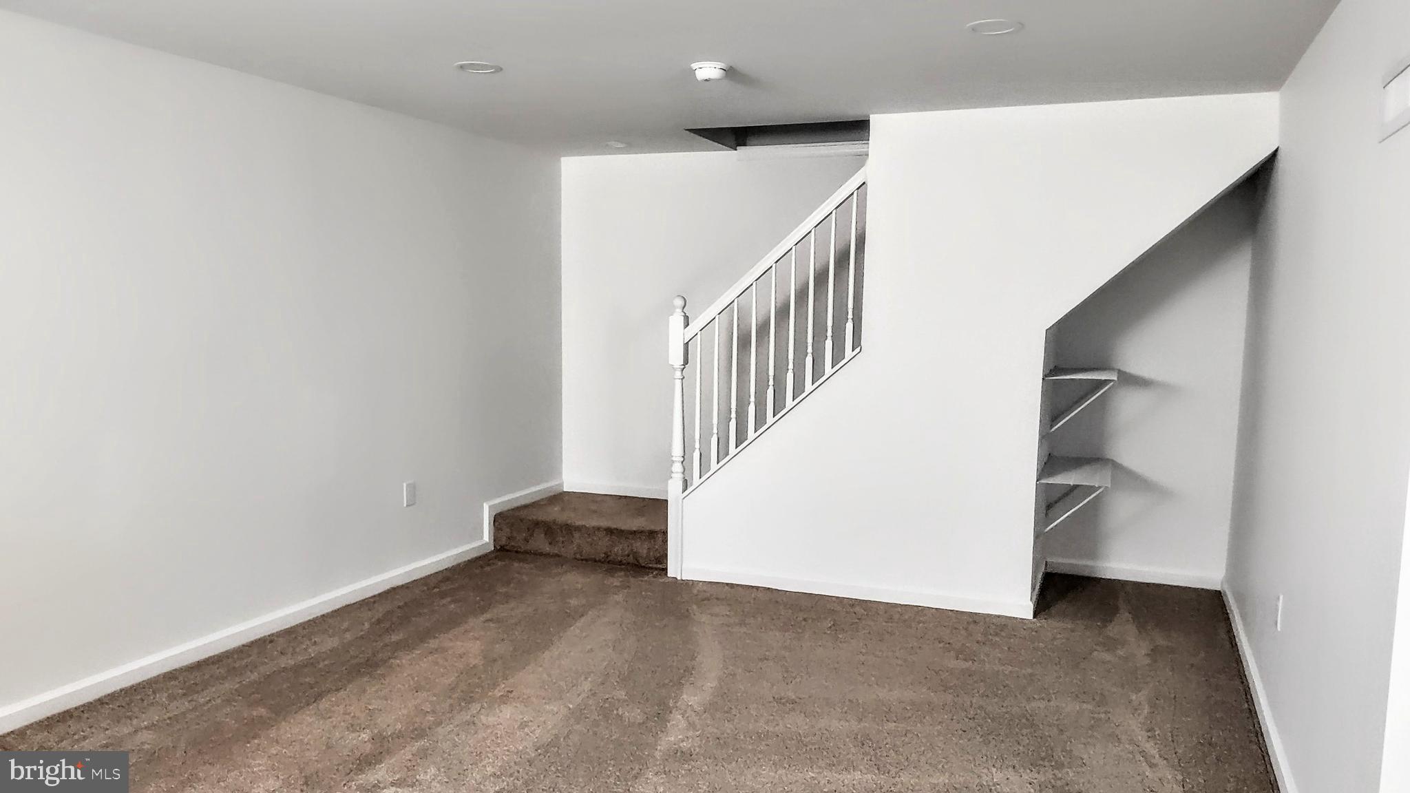 645 West 1st Street Boiling Springs, PA 17007 - Photo 15 of 23 a view of hallway with stairs
