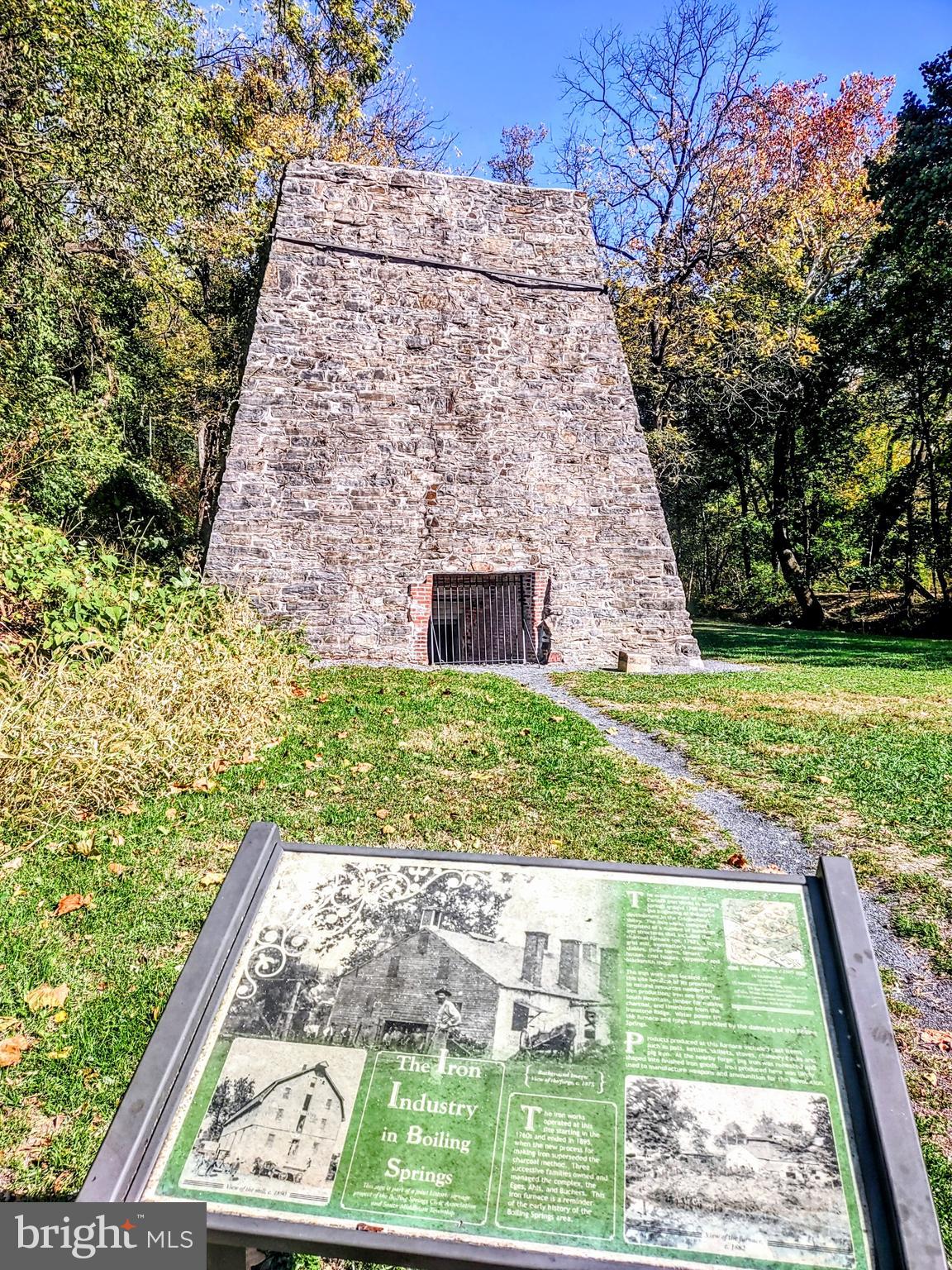 645 West 1st Street Boiling Springs, PA 17007 - Photo 22 of 23 a view of a yard with yellow lighting