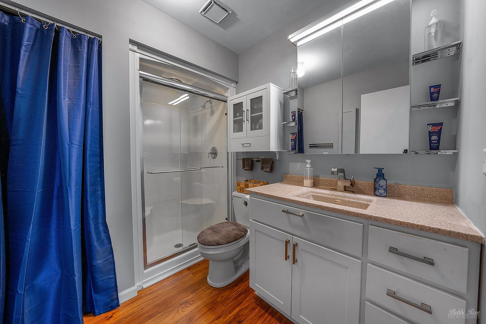 834 Golf Course Road Crystal Lake, IL 60014 - Photo 23 of 40 a bathroom with a granite countertop sink toilet and shower