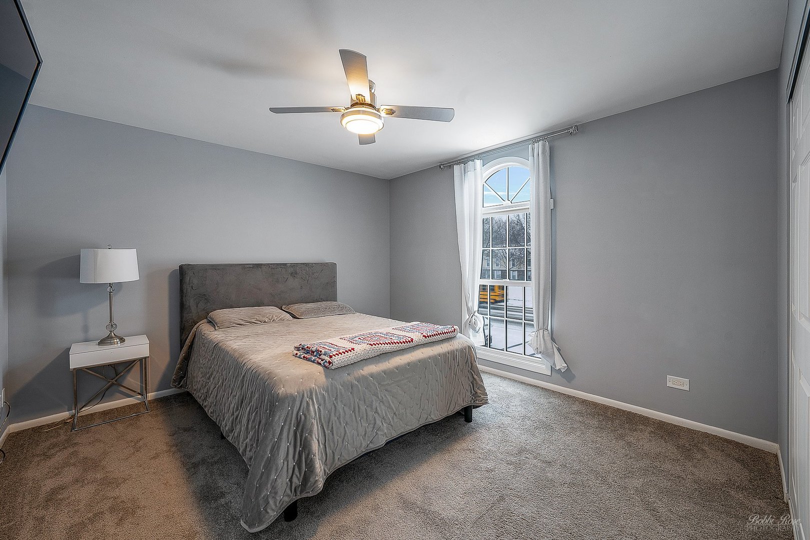 834 Golf Course Road Crystal Lake, IL 60014 - Photo 25 of 40 a bedroom with a bed and window
