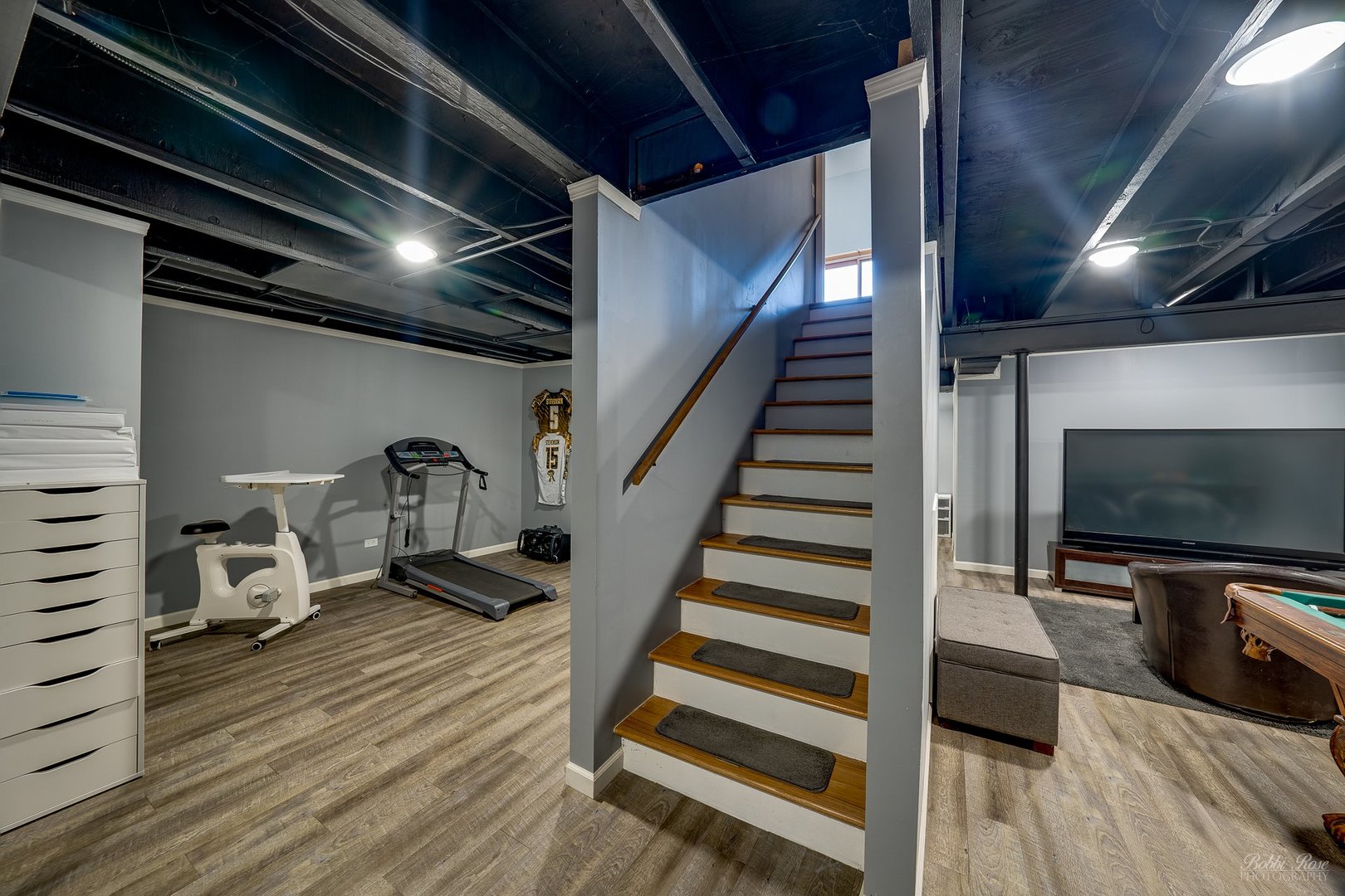 834 Golf Course Road Crystal Lake, IL 60014 - Photo 27 of 40 a view of a livingroom with wooden floor and furniture