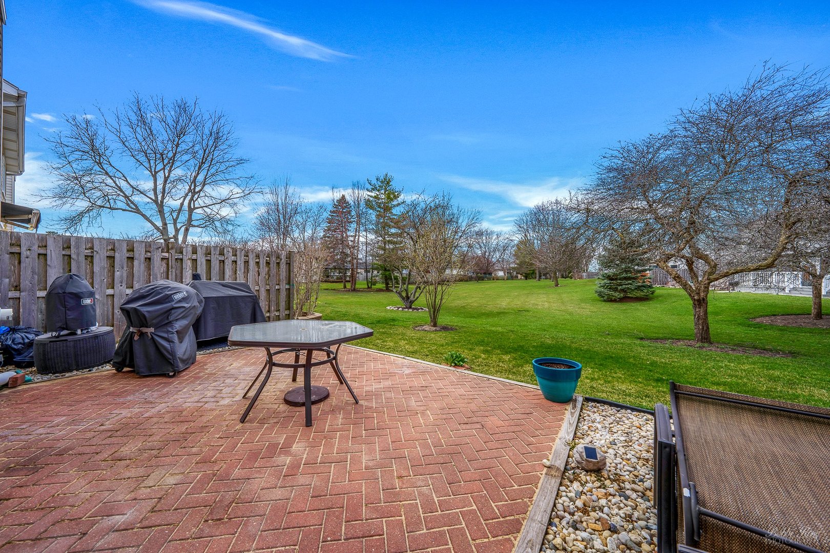 834 Golf Course Road Crystal Lake, IL 60014 - Photo 32 of 40 a view of a patio with a yard