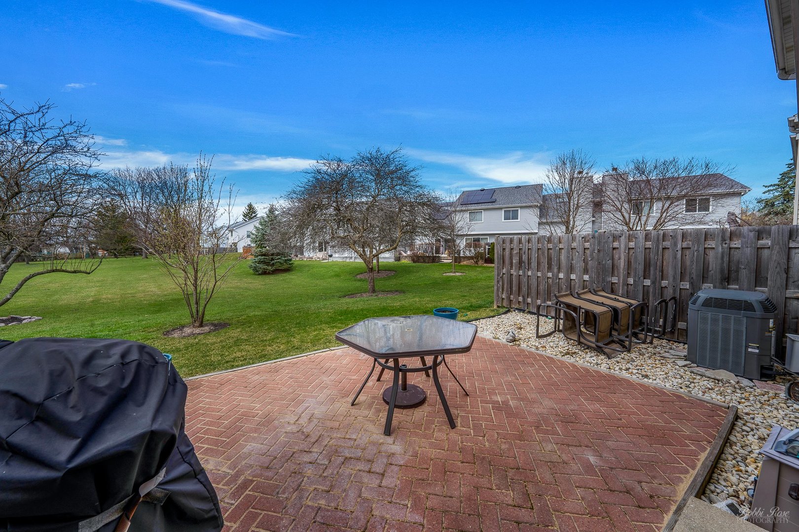 834 Golf Course Road Crystal Lake, IL 60014 - Photo 33 of 40 a view of a chair and table on the garden