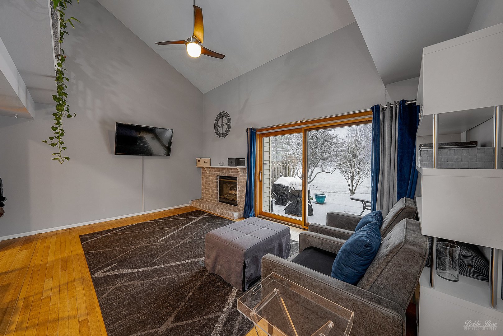 834 Golf Course Road Crystal Lake, IL 60014 - Photo 10 of 40 a bedroom with furniture and a flat screen tv