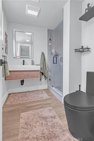 a living room with a couch and a dresser