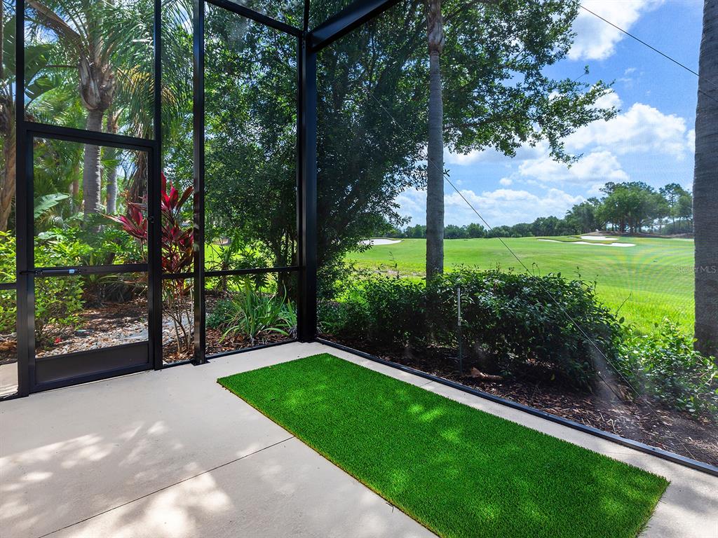 7431 Greystone Street Lakewood Ranch, FL 34202 - Photo 57 of 85 a view of a backyard with a garden