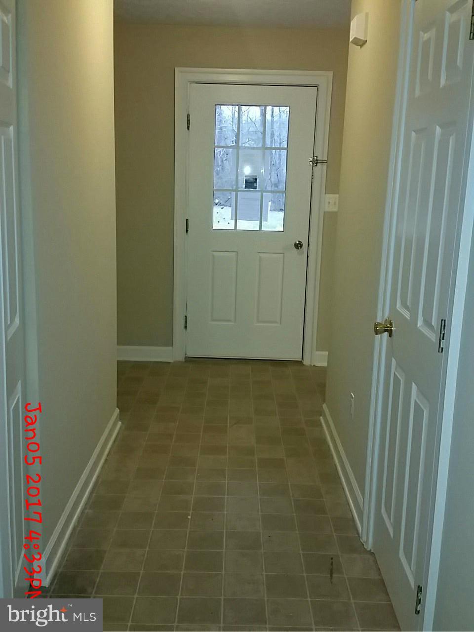 9285 Caledon Road King George, VA 22485 - Photo 5 of 17 looking down the hallway at front entry